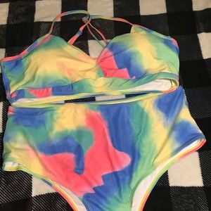 Never been worn, multi color swim suit,